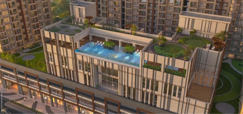 Rooftop infinity pool deck overlooking Pune skyline at sunset